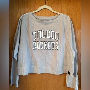 Under Armour Light Gray Top. Toledo Rockets. University of Toledo.